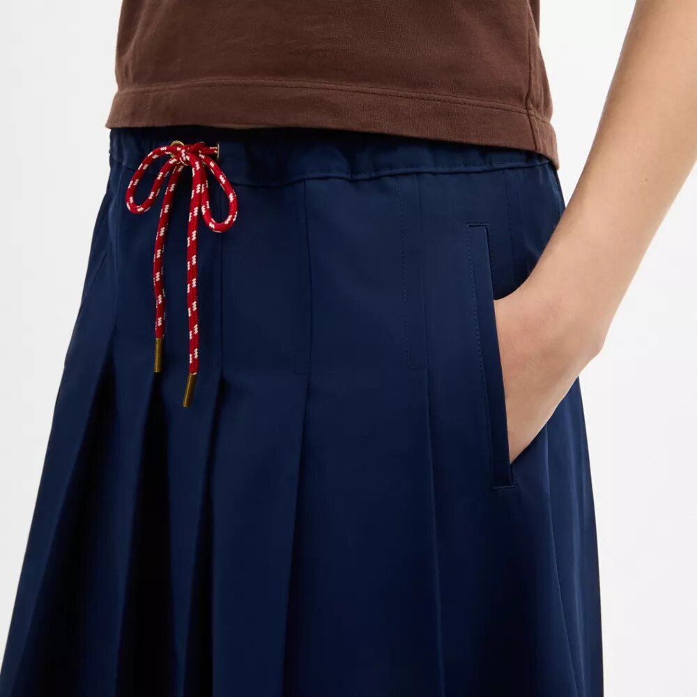 Fustă midi plisată, în stil sportiv