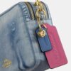 Geantă Carey purtată pe umăr din denim „Loved” cu pandantive