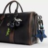 Geantă Compass 35 din piele uzată cu pandantive