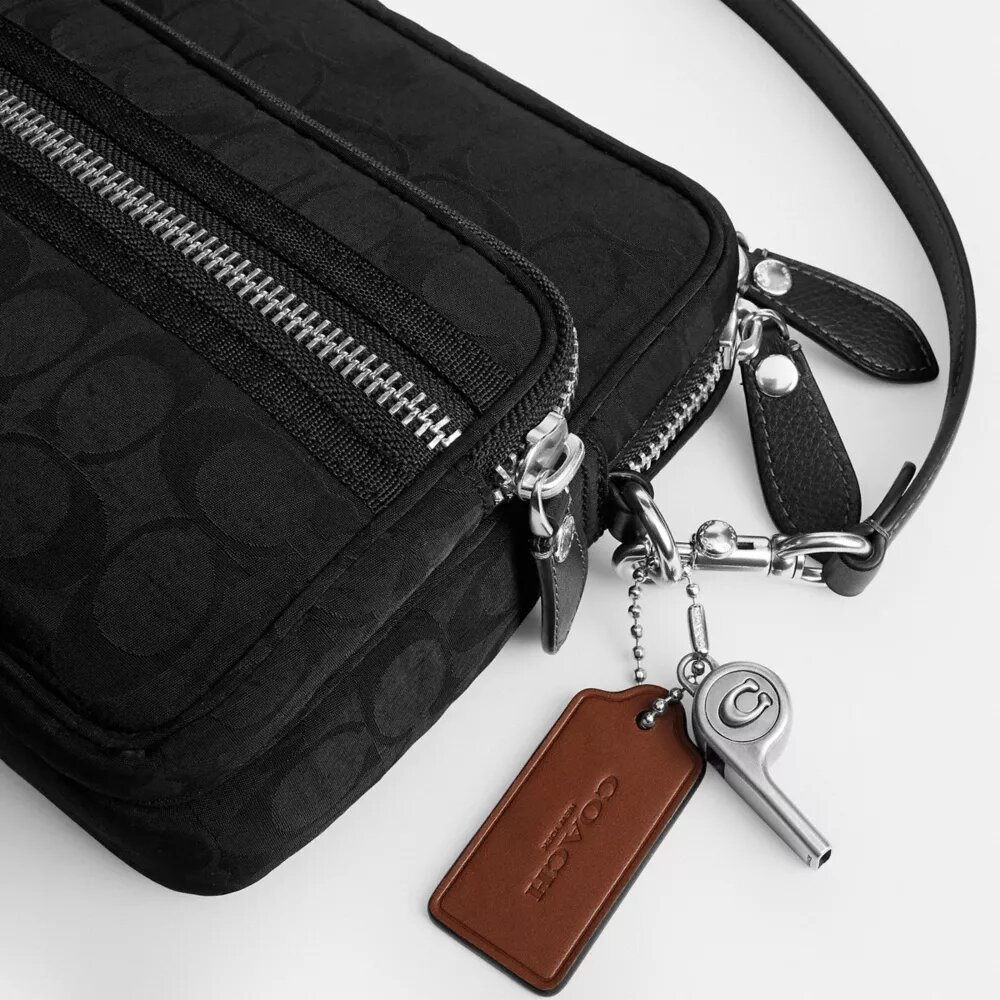 Geantă crossbody Dakota din nailon semnătura