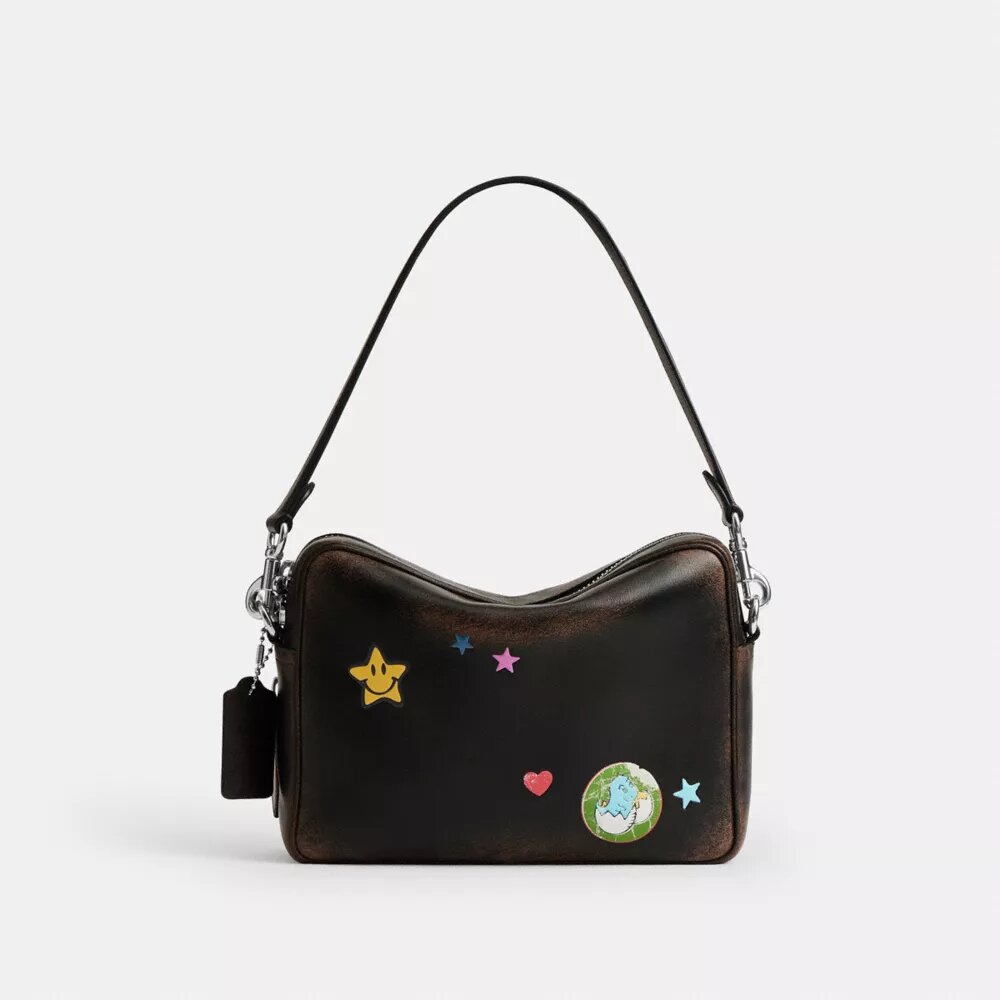 Geantă crossbody Dakota „Rexy 10Th Birthday” din piele uzată, cu imprimeu de autocolante
