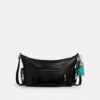 Geantă crossbody Finn cu buzunare și pandantive