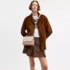 Geantă crossbody Klare din Signature Canvas