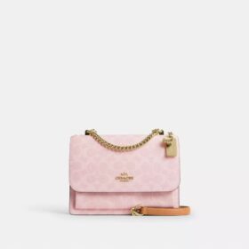 Geantă crossbody Klare din Signature Canvas cu pandantive