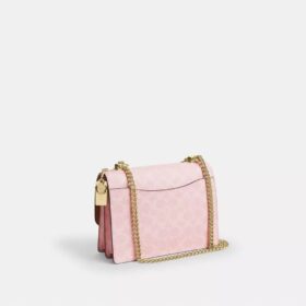 Geantă crossbody Klare din Signature Canvas cu pandantive
