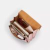 Geantă crossbody Klare din Signature Canvas cu pandantive