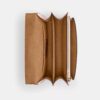 Geantă crossbody Klare din Signature Canvas cu pandantive