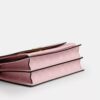 Geantă crossbody Klare din Signature Canvas cu pandantive