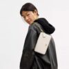Geantă crossbody Mila cu Signature Canvas