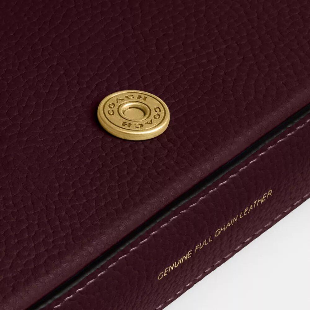 Geantă crossbody Mila cu Signature Canvas