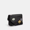 Geantă de curier Hitch din Signature Canvas cu patch-uri
