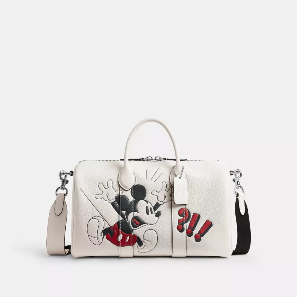 Geantă Disney X Coach Compass 35 cu Mickey Mouse