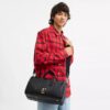 Geantă Disney X Coach Compass 35 cu Mickey Mouse