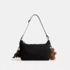 Geantă Leo Crossbody din nailon semnătura cu pandantive