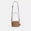 Geantă mini Carey crossbody din Signature Canvas