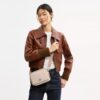 Geantă mini Carey crossbody din Signature Canvas
