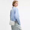 Geantă mini Carey crossbody din Signature Canvas