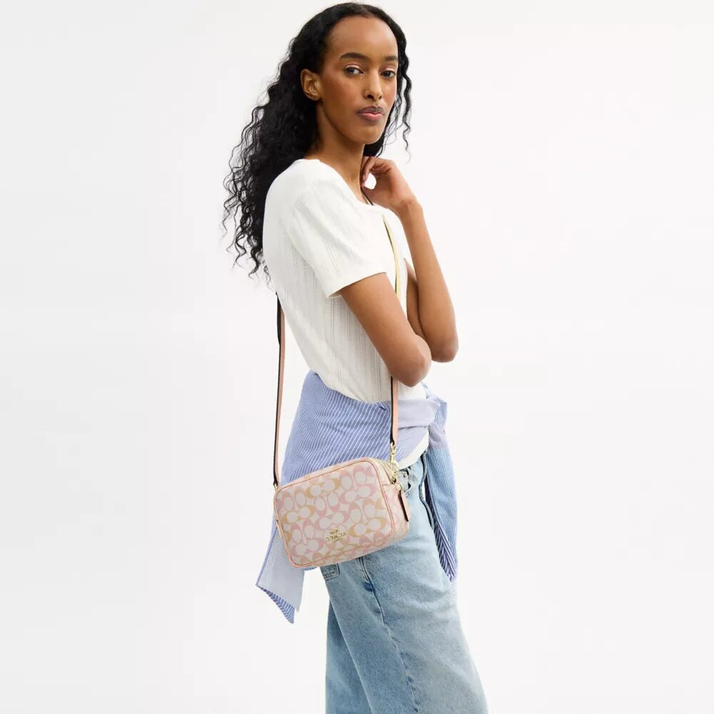 Geantă mini Carey crossbody din Signature Canvas