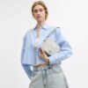 Geantă mini Carey crossbody din Signature Canvas