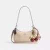 Geantă mini crossbody Teri cu pandantive