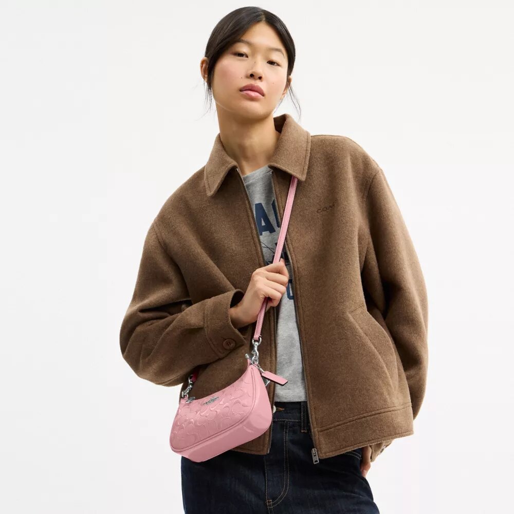 Geantă mini crossbody Teri din piele semnătură cu pandantiv în formă de inimă