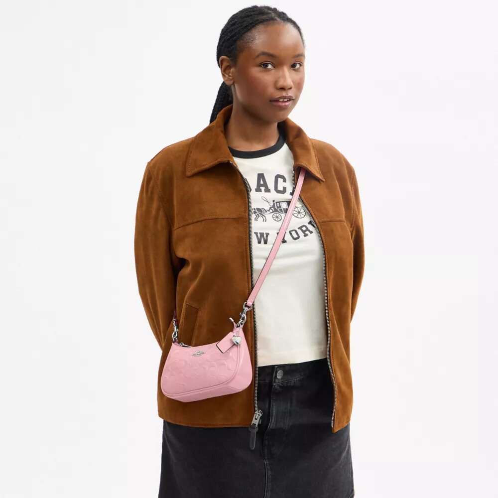 Geantă mini crossbody Teri din piele semnătură cu pandantiv în formă de inimă