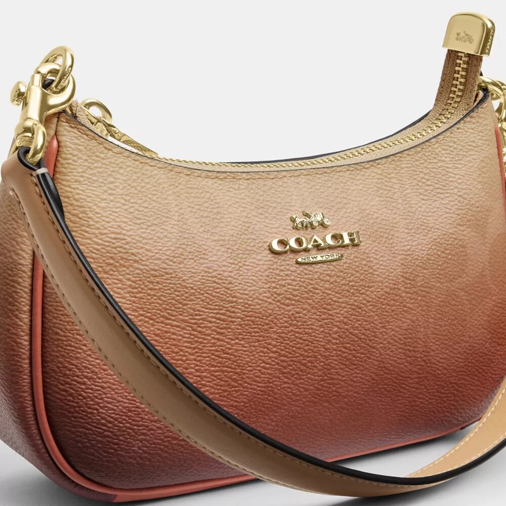 Geantă mini crossbody Teri din pânză Ombre Signature Canvas