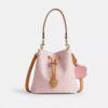 Geantă tip sac Rowan din Signature Canvas cu pandantive