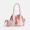 Geantă tip sac Rowan din Signature Canvas cu pandantive