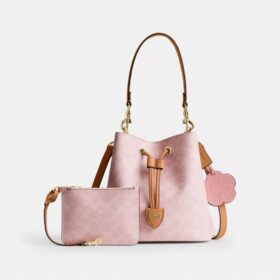 Geantă tip sac Rowan din Signature Canvas cu pandantive