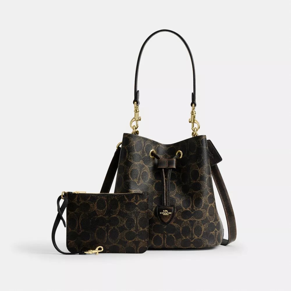 Geantă tip sac Rowan din Signature Canvas cu pandantive