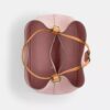 Geantă tip sac Rowan din Signature Canvas cu pandantive