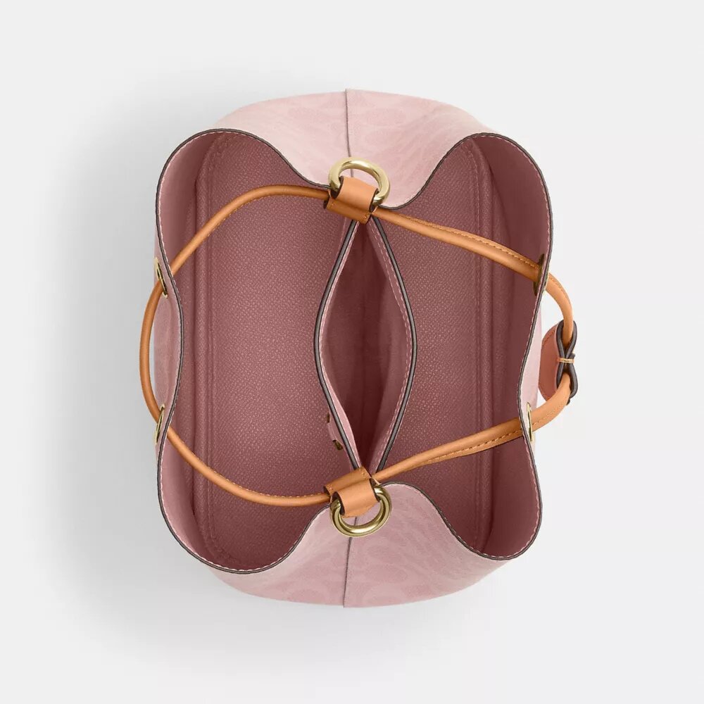 Geantă tip sac Rowan din Signature Canvas cu pandantive