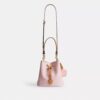 Geantă tip sac Rowan din Signature Canvas cu pandantive