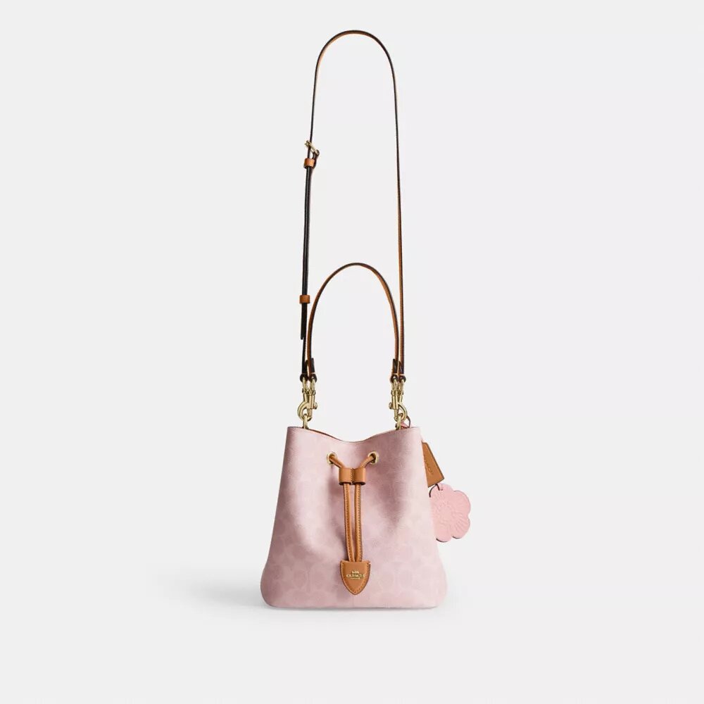 Geantă tip sac Rowan din Signature Canvas cu pandantive