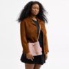 Geantă tip sac Rowan din Signature Canvas cu pandantive