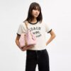 Geantă tip sac Rowan din Signature Canvas cu pandantive
