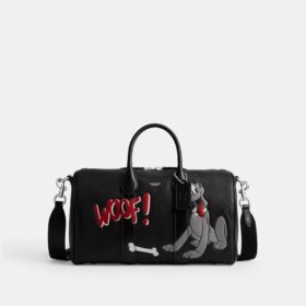 Geanta Disney X Coach Compass 35 cu Pluto