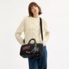 Geanta Disney X Coach Compass 35 cu Pluto