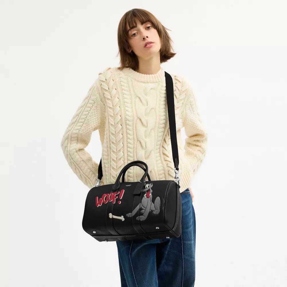 Geanta Disney X Coach Compass 35 cu Pluto