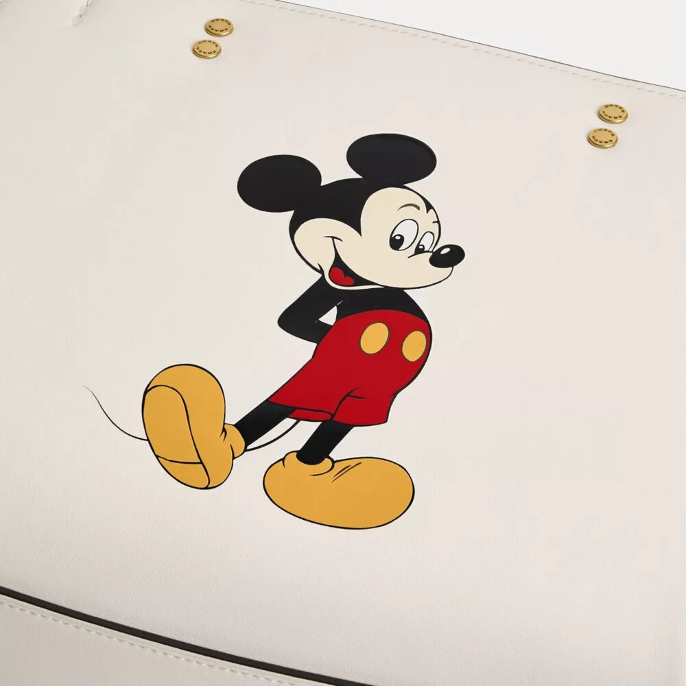 Geanta Disney X Coach Rogue 25 cu Mickey Mouse
