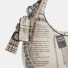 Gență crossbody Carmen mini cu imprimeu de ziar