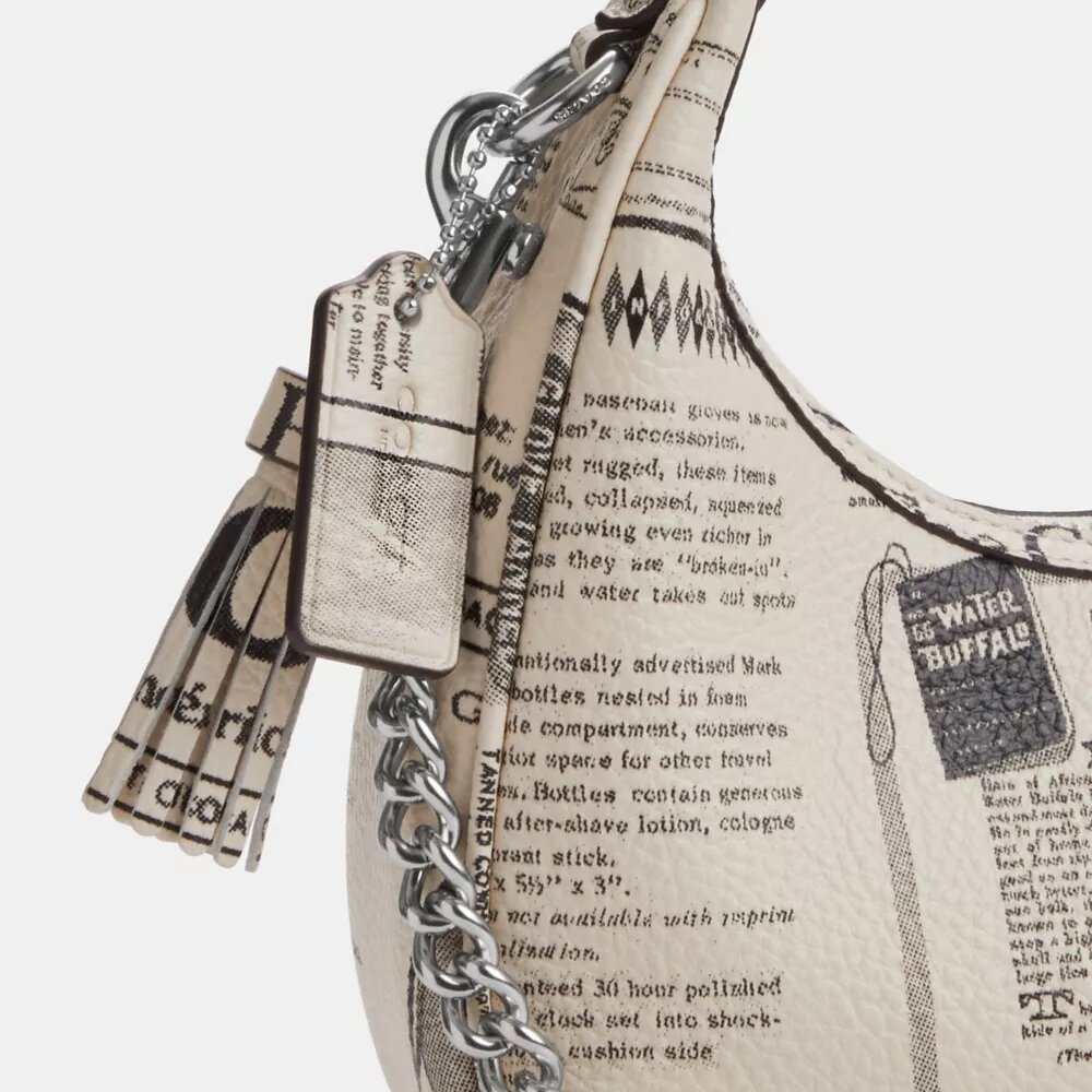 Gență crossbody Carmen mini cu imprimeu de ziar