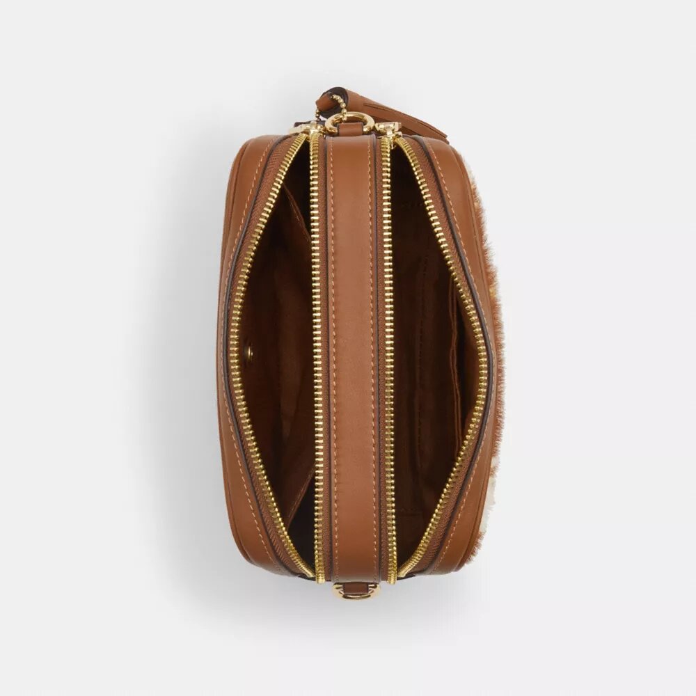 Gență crossbody mini Carey din piele de vițel cu imprimeu de vacă