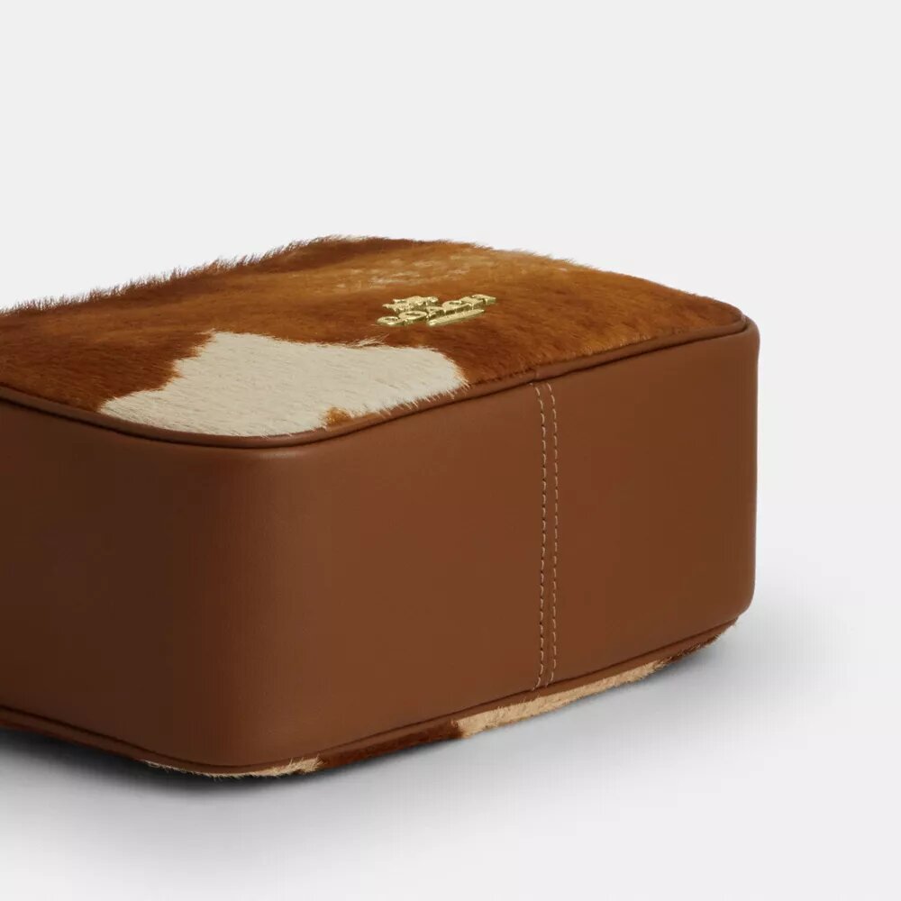 Gență crossbody mini Carey din piele de vițel cu imprimeu de vacă