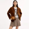 Gență crossbody mini Carey din piele de vițel cu imprimeu de vacă