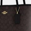 Gență de mână medie de tip „City Tote” din Signature Canvas