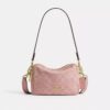 Gența crossbody mini Carey cu curea transversală din denim semnătura