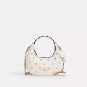Genți crossbody Carmen mini cu curea transversală și nituri în formă de inimă