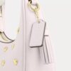 Genți crossbody Carmen mini cu curea transversală și nituri în formă de inimă